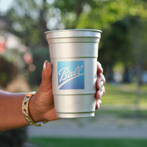 Hand holding a Ball Aluminum Cup