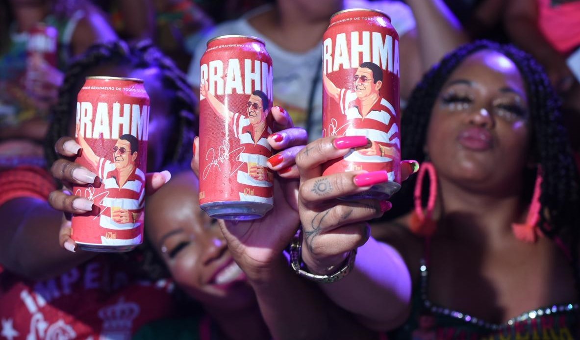 People Holding Brahm Cans