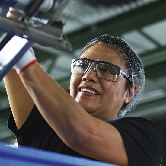 Woman working in plant