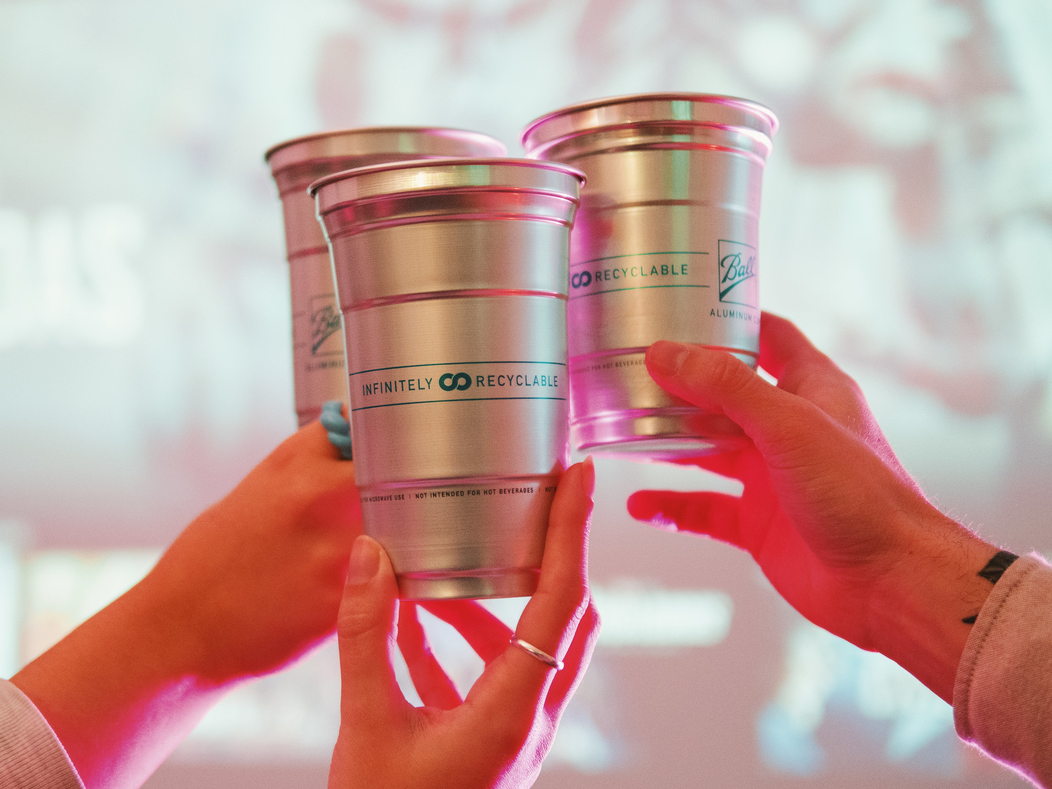 Photo of three cups cheering 