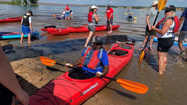 Ball employees and family members kayaking at 2021 Adaptive Adventures Multi-Sport Day event